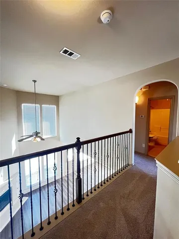 a view of a livingroom with a ceiling fan