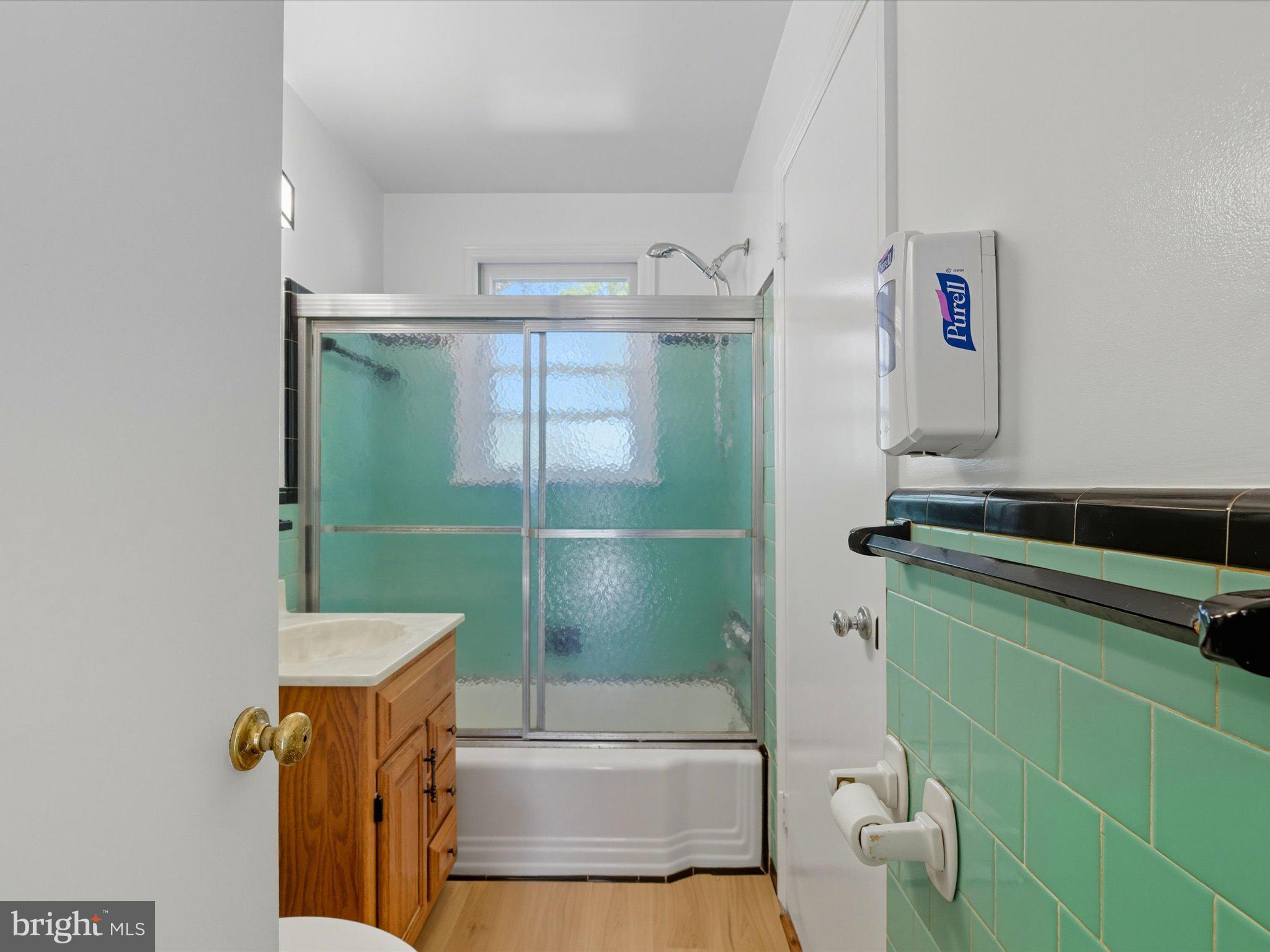 12907 Matey Road Silver Spring, MD 20906 - Photo 20 of 45 a bathroom with a shower and a sink