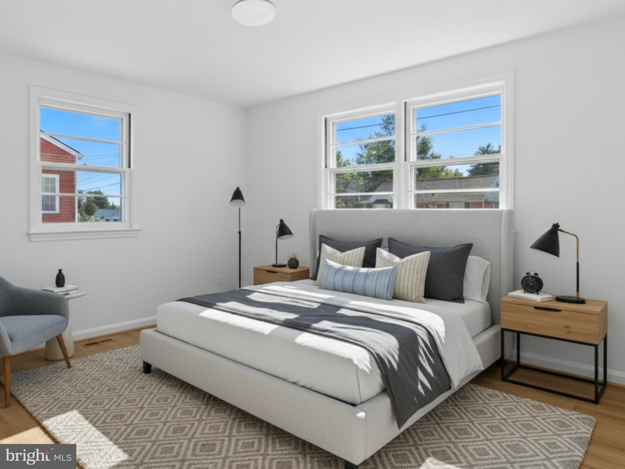 12907 Matey Road Silver Spring, MD 20906 - Photo 21 of 45 a bedroom with bed and a window