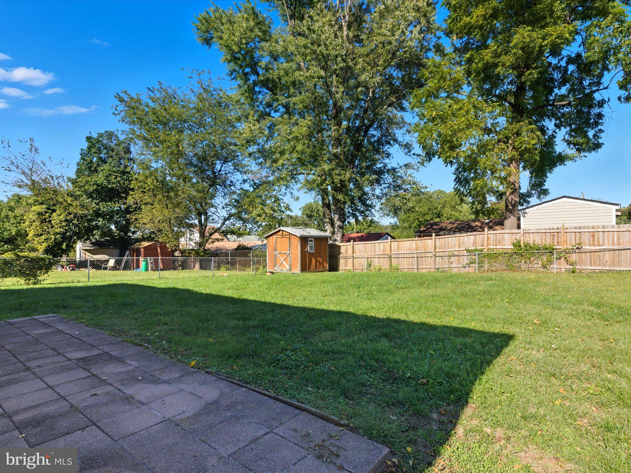 12907 Matey Road Silver Spring, MD 20906 - Photo 30 of 45 a view of a house with a yard