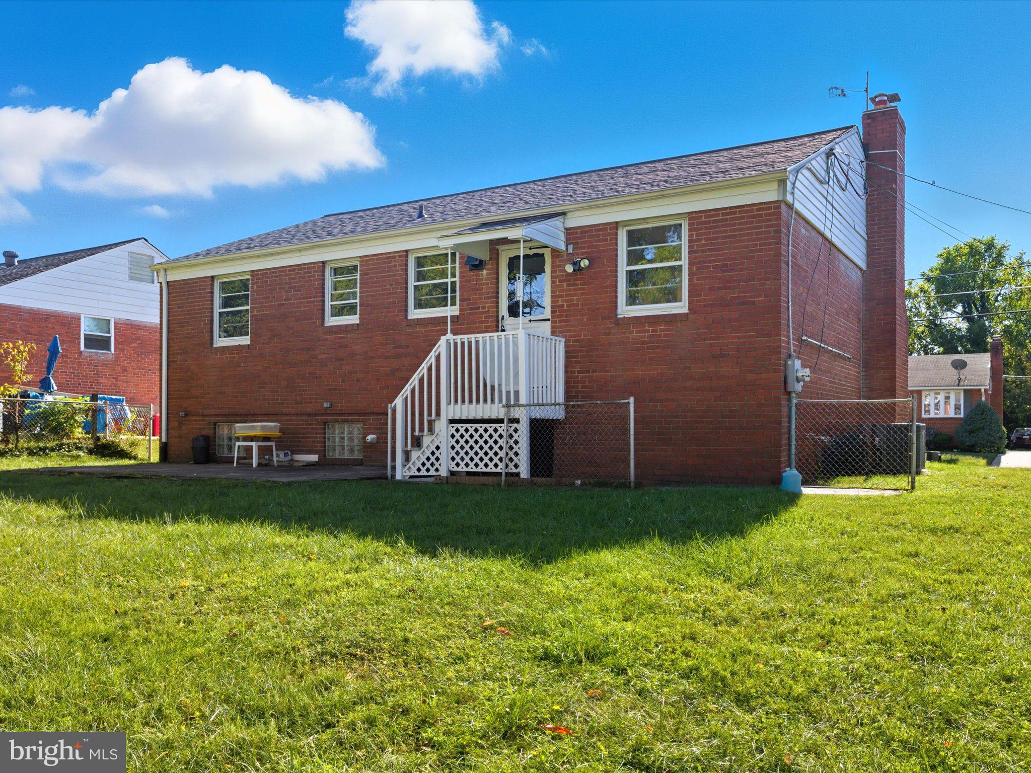 12907 Matey Road Silver Spring, MD 20906 - Photo 31 of 45 a view of a house with a yard
