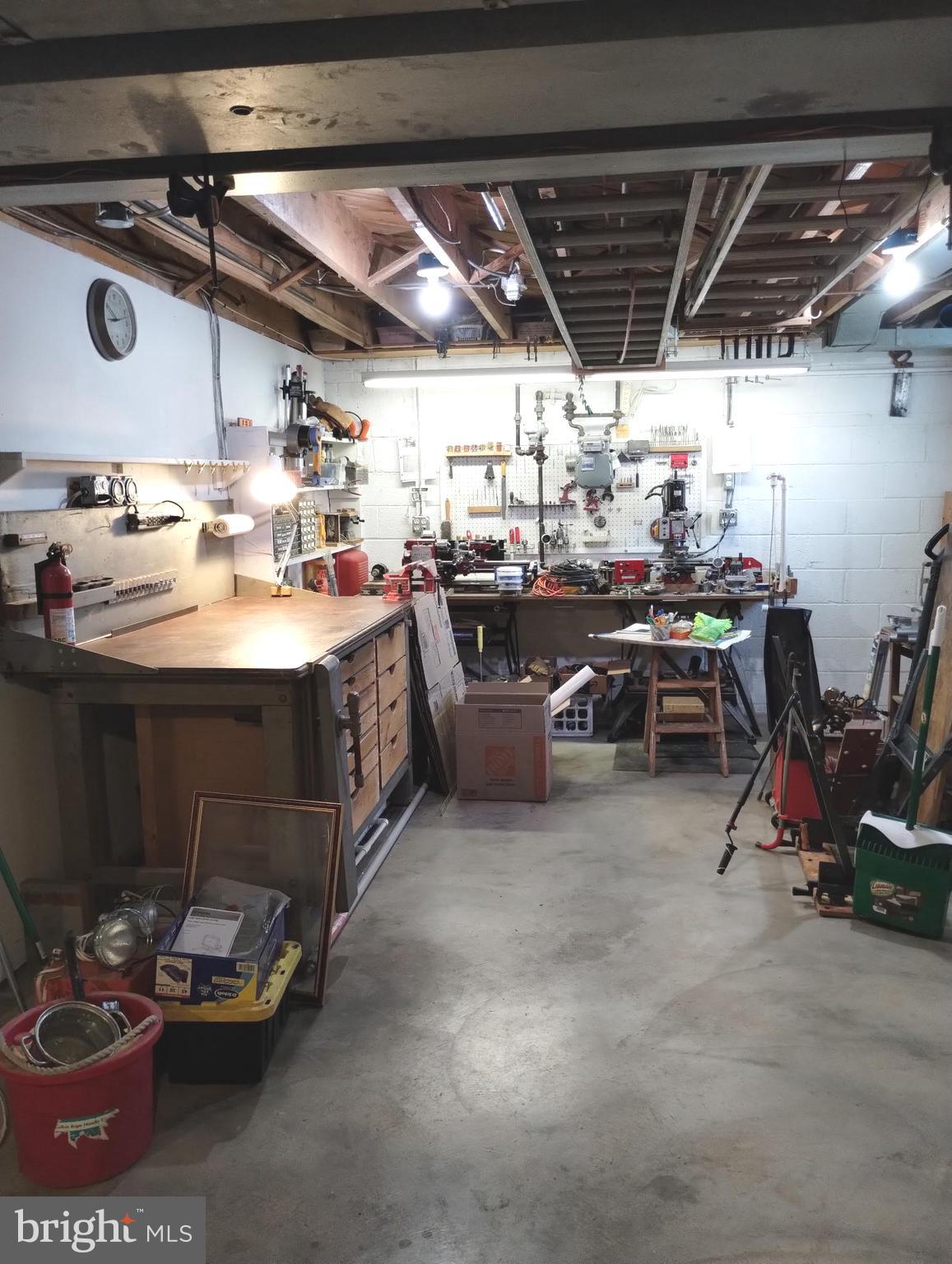 12907 Matey Road Silver Spring, MD 20906 - Photo 36 of 45 a utility room with a sink a washer and dryer