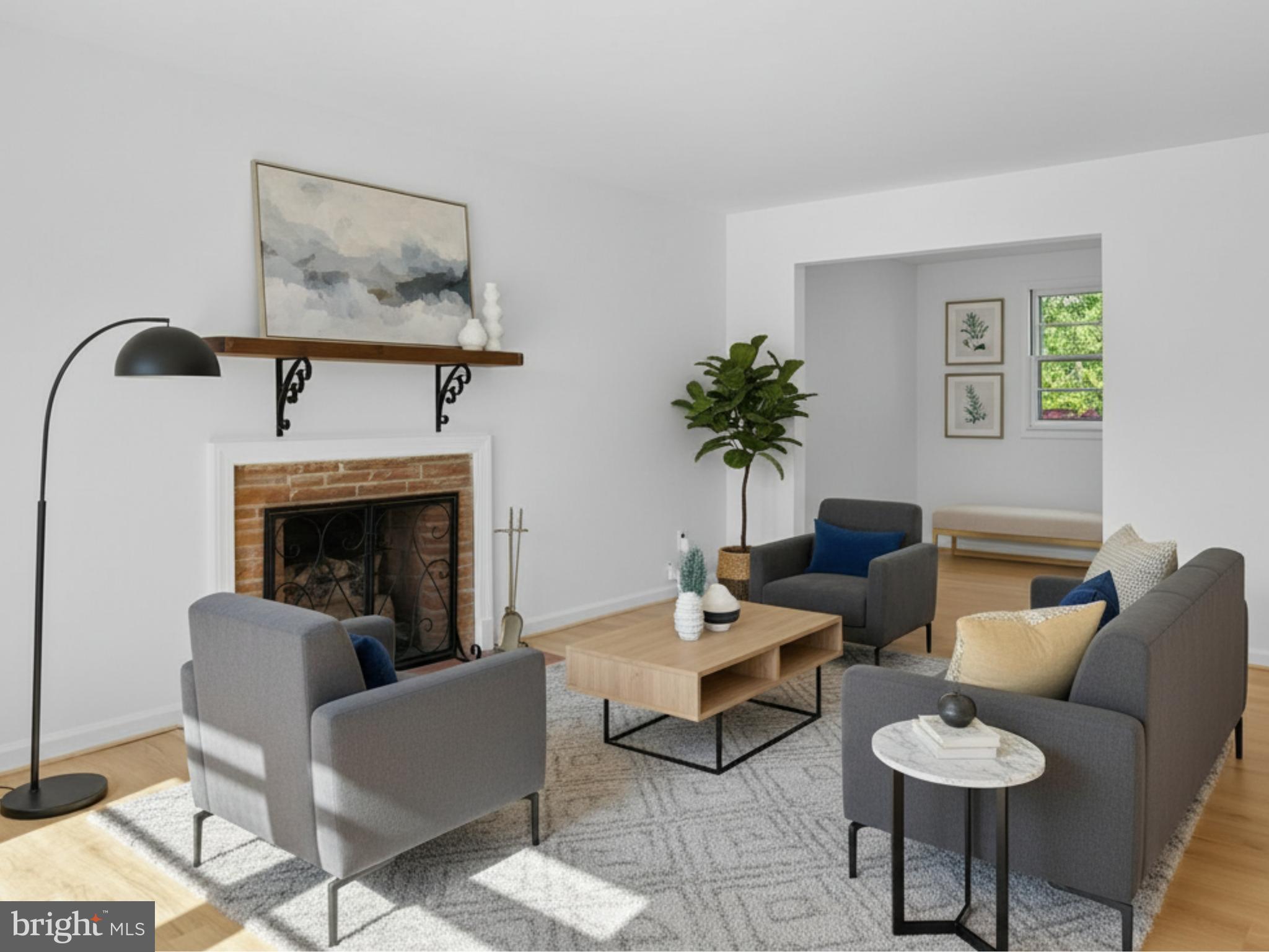 12907 Matey Road Silver Spring, MD 20906 - Photo 4 of 45 a living room with furniture and a fireplace