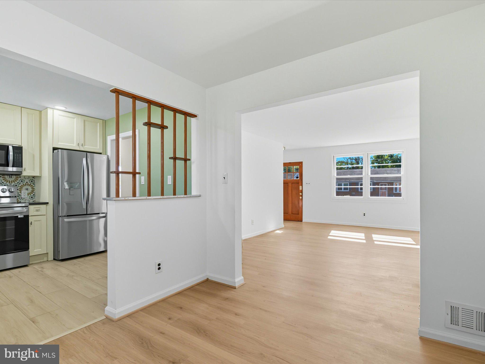 12907 Matey Road Silver Spring, MD 20906 - Photo 10 of 45 a view of an empty room with a window