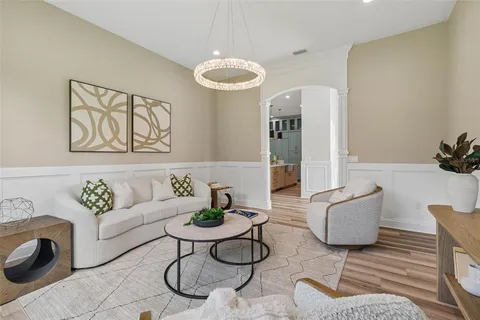a kitchen with a sink appliances and a counter top space