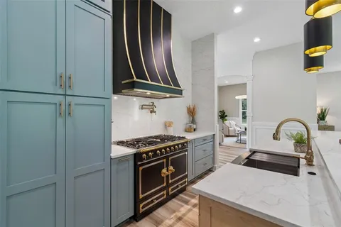 a bedroom with a bed and a night stand