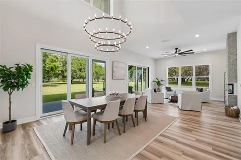 a view of a swimming pool with a yard