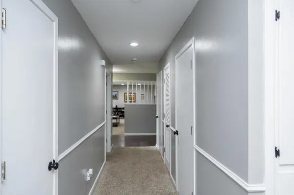 a view of storage and utility room with a window