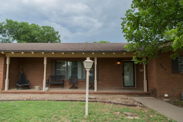 a view of a house with a porch