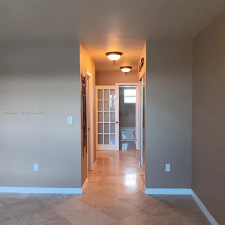 $199,000 | 1075 Northeast Miami Gardens Drive, Unit 306, Miami, FL 33179