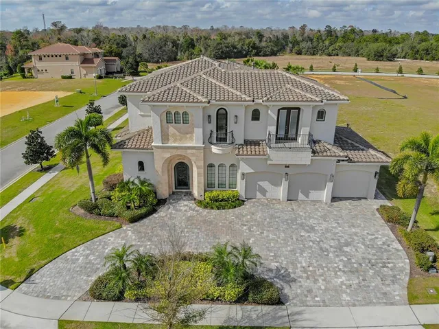 an aerial view of a house with a garden