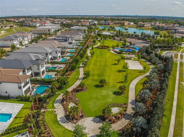an aerial view of a pool patio swimming pool and outdoor seating