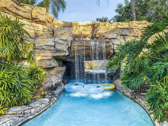 a view of pool with outdoor seating