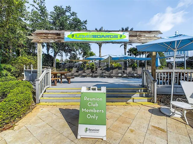 a view of a building with sitting area