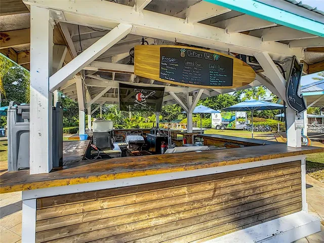 a house with palm tree in front of it