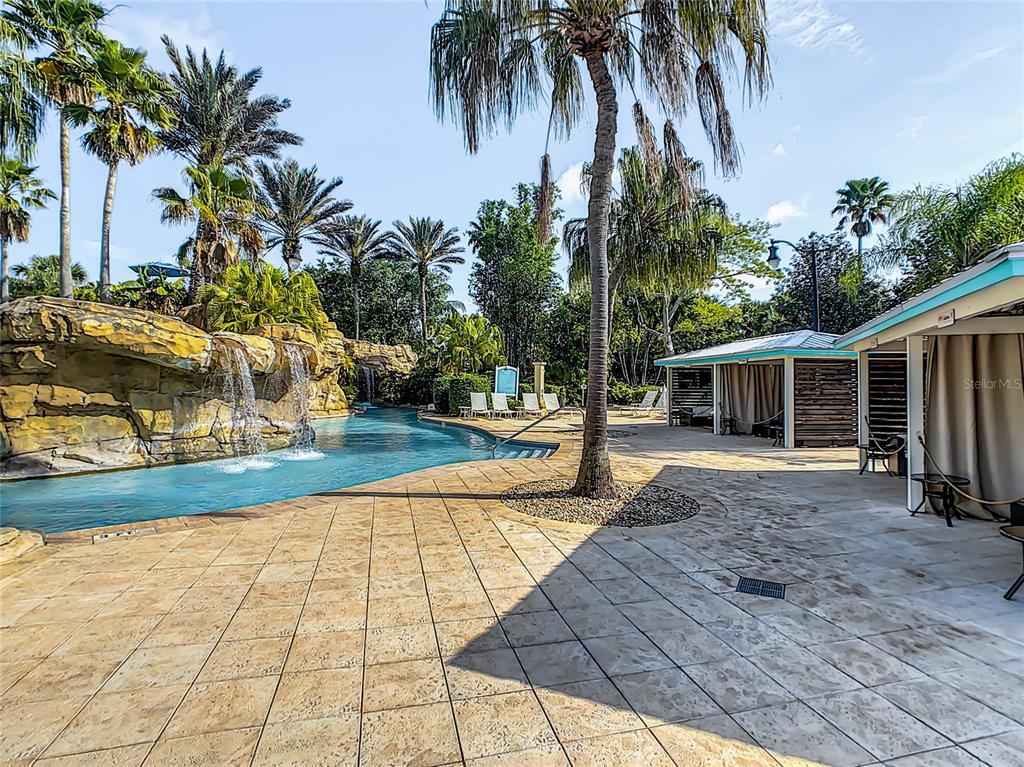 8033 Twin Eagles Loop Reunion, FL 34747 - Photo 42 of 42 a house with palm tree in front of it