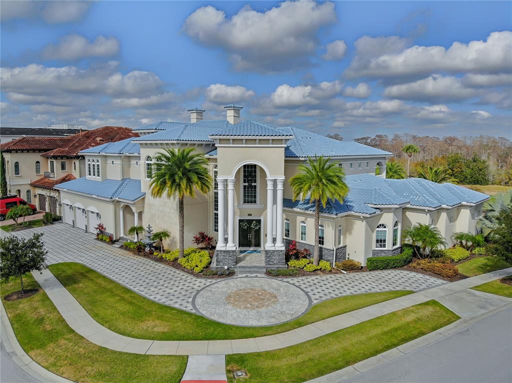 8033 Twin Eagles Loop Reunion, FL 34747 - Photo 7 of 42 a view of a house with swimming pool and furniture