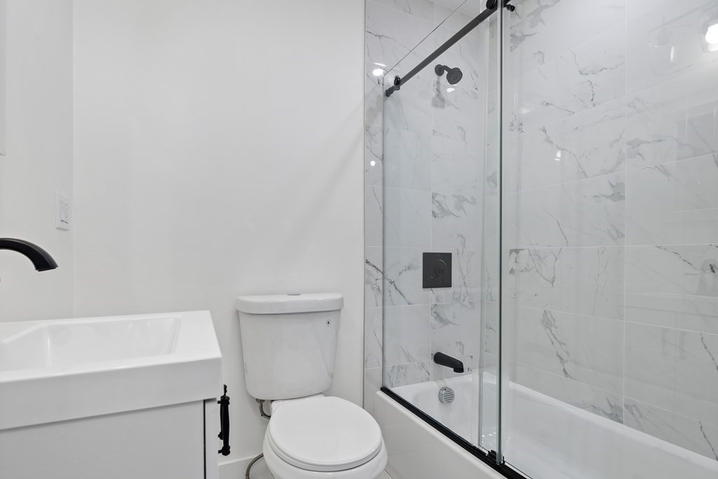 86 West Street Newton, MA 02458 - Photo 6 of 19 a bathroom with a toilet and a shower