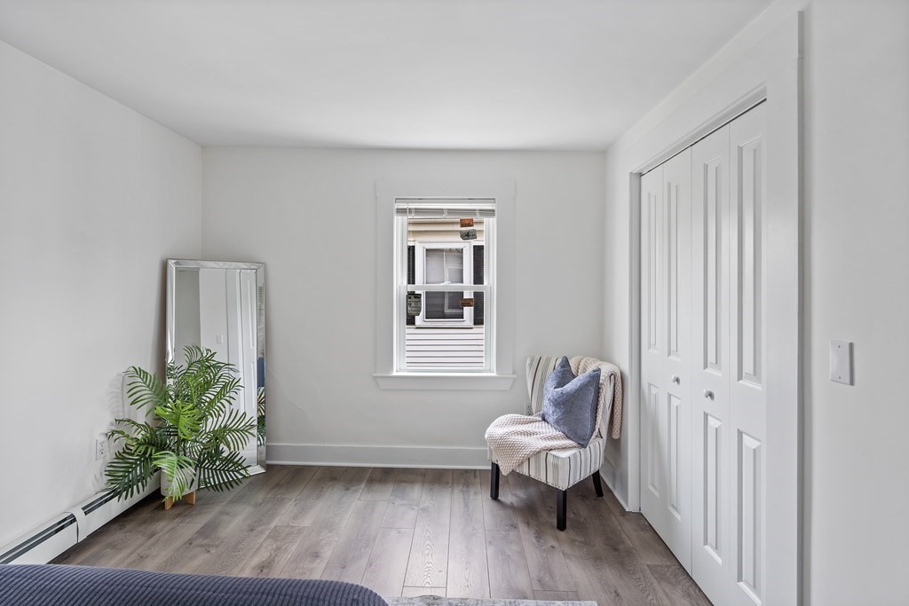 86 West Street Newton, MA 02458 - Photo 10 of 19 a living room with furniture and a window