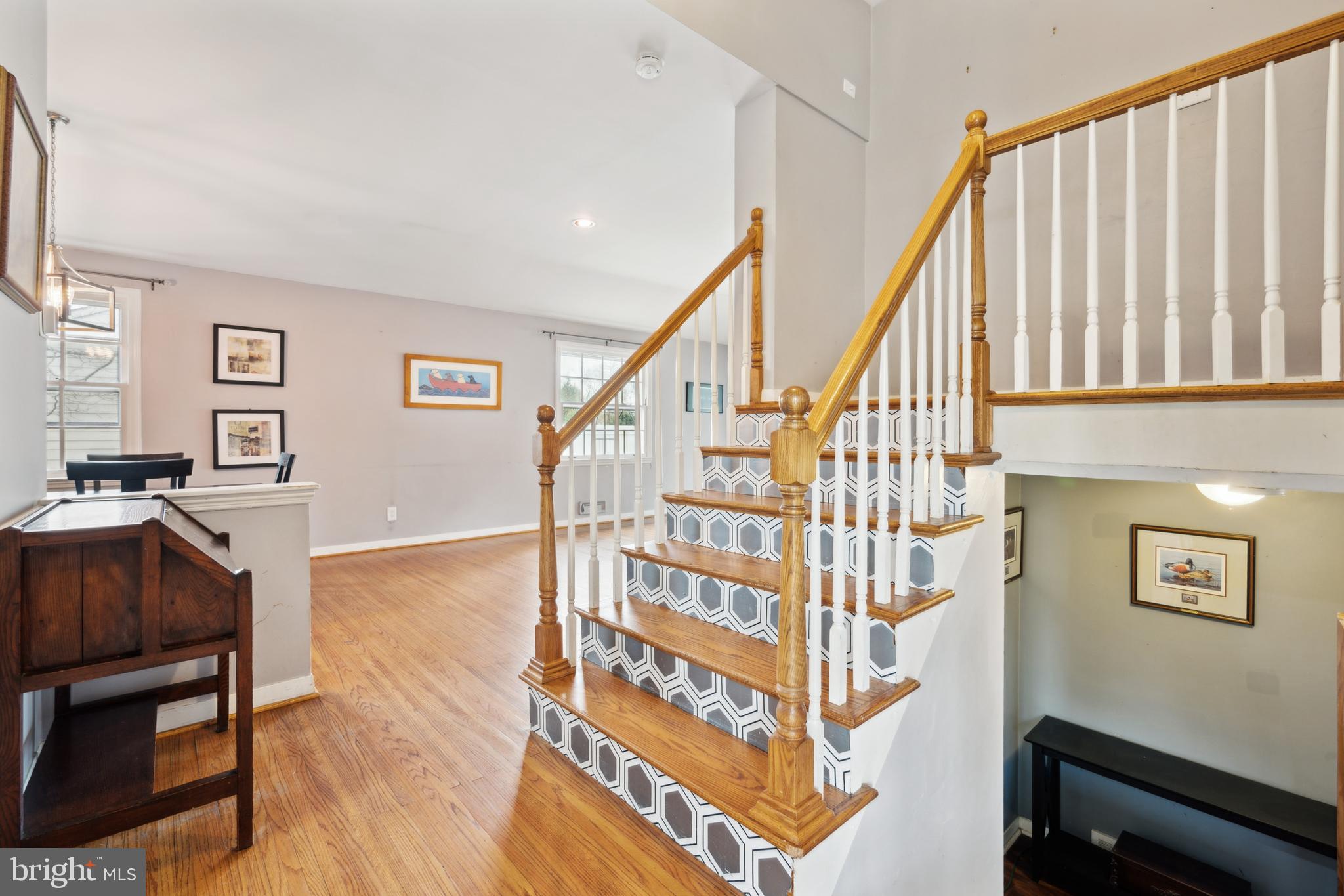 110 Sharrowvale Road Cherry Hill, NJ 08034 - Photo 3 of 25 a view of an entryway with wooden floor and stairs