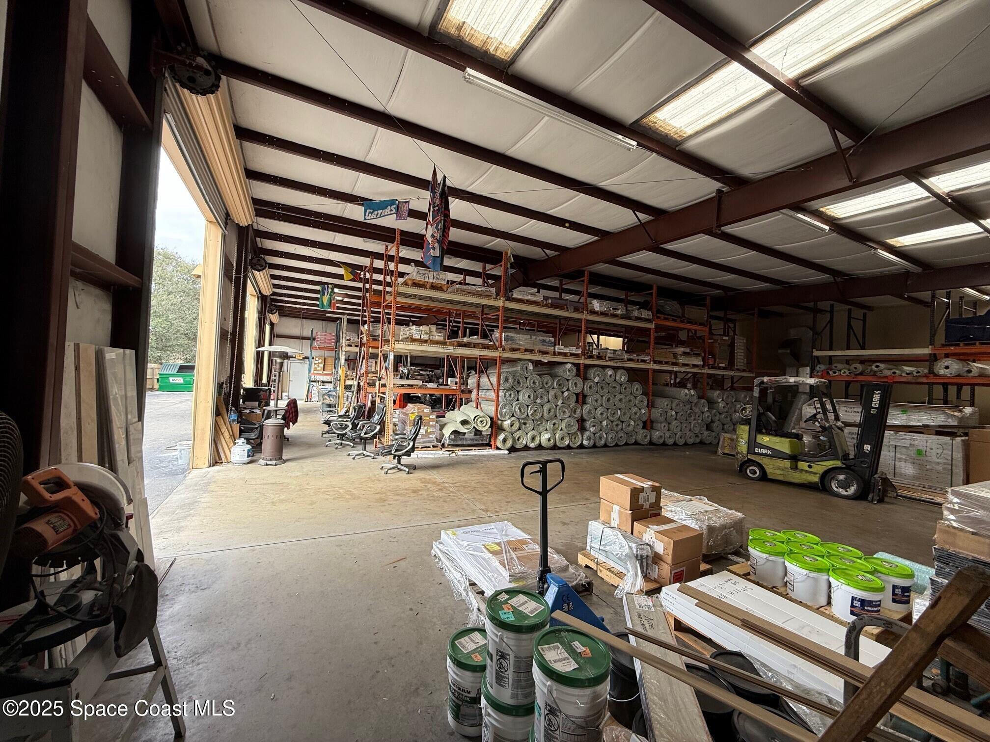 1301 Lake Washington Road Melbourne, FL 32935 - Photo 5 of 13 a view of a garage with stuff