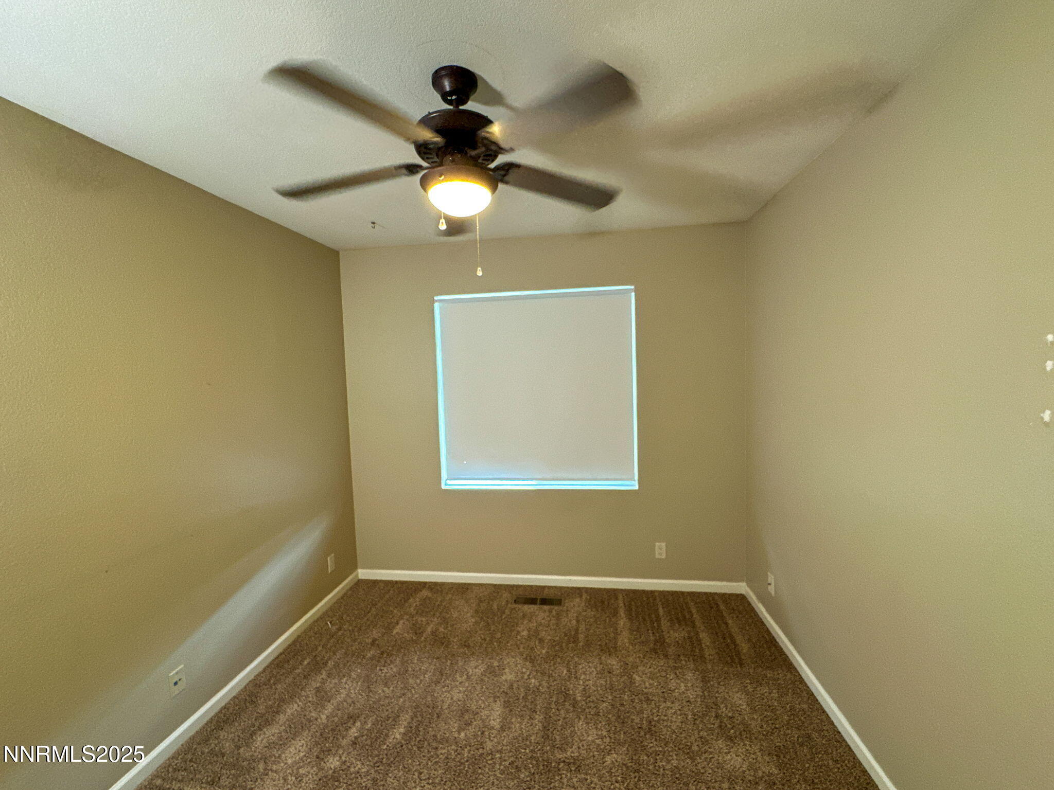 2185 Eagle Greens Drive Reno, NV 89521 - Photo 11 of 22 a view of an empty room and window