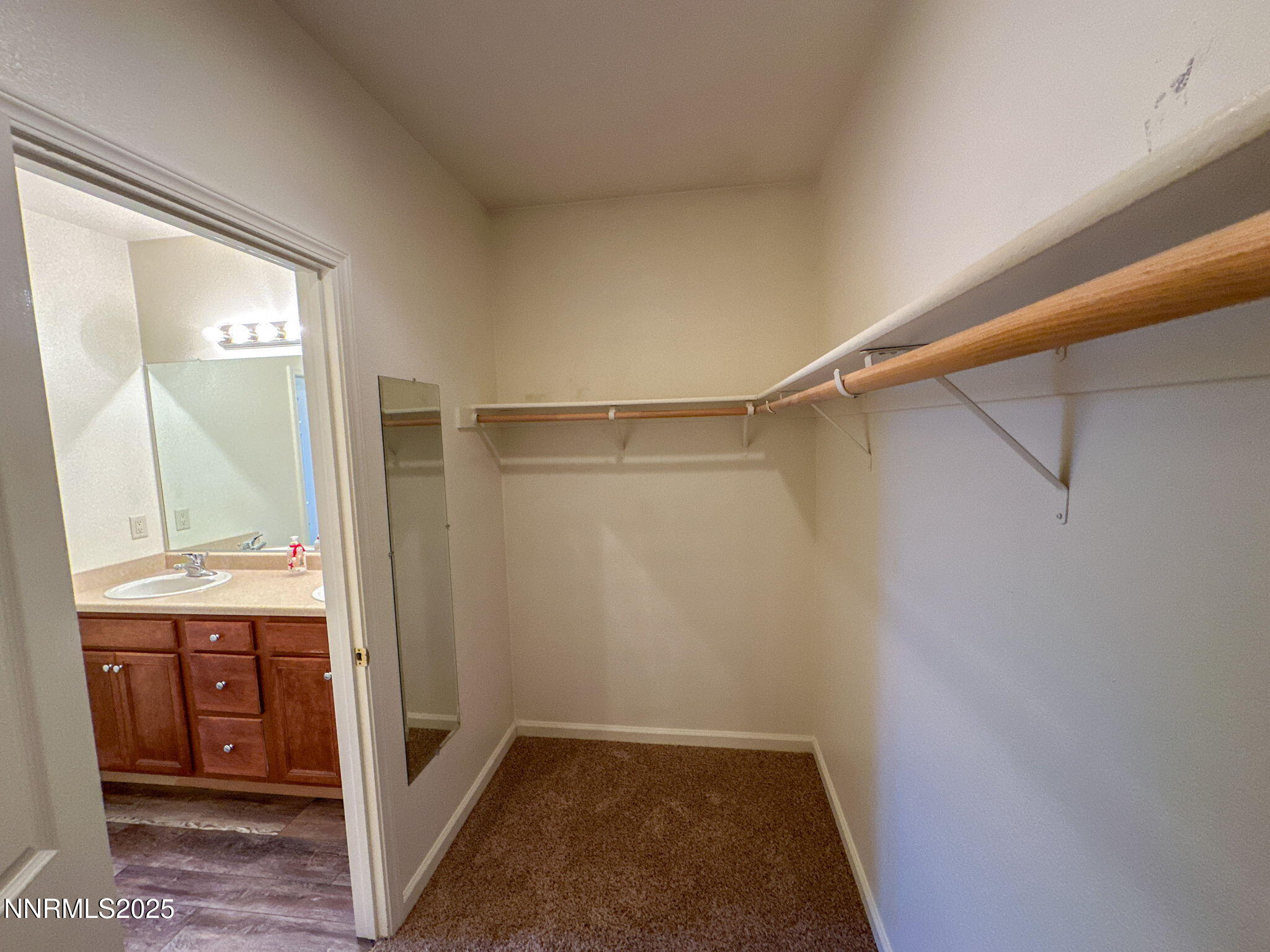 2185 Eagle Greens Drive Reno, NV 89521 - Photo 14 of 22 a bathroom with a sink and a mirror