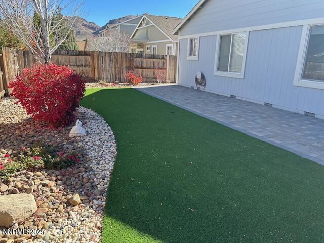 2185 Eagle Greens Drive Reno, NV 89521 - Photo 20 of 22 a front view of a house with a garden and yard
