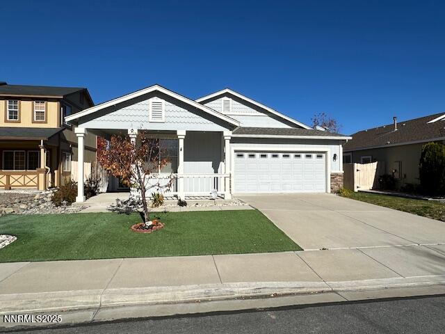 2185 Eagle Greens Drive Reno, NV 89521 - Photo 5 of 22 a front view of a house with a yard and garage