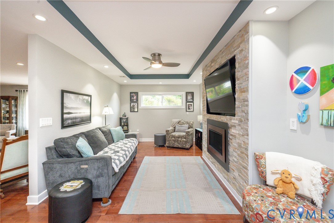 1303 Elon Road Henrico, VA 23229 - Photo 16 of 62 Family room with tray ceiling, recessed lights, ce