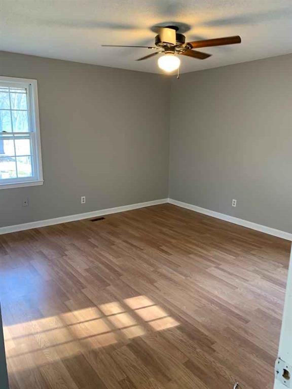 846 Idlewood Road Winder, GA 30680 - Photo 15 of 27 a view of empty room with wooden floor