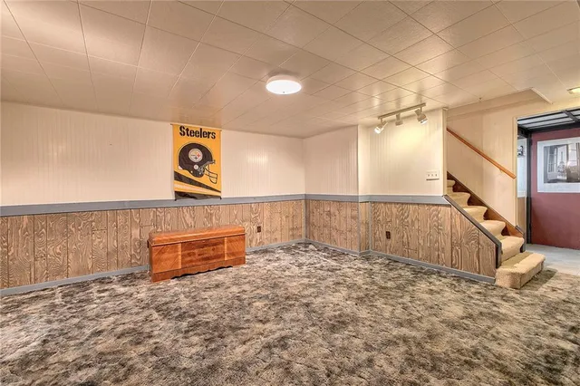 a view of a room with racks on the wall