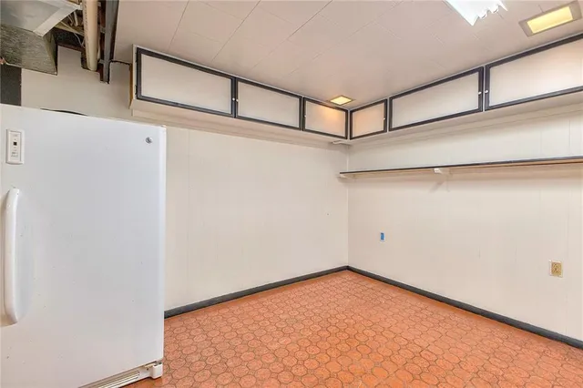 a view of a house with a balcony and door