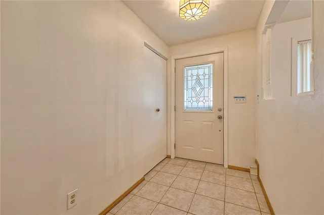 a view of an empty room and window