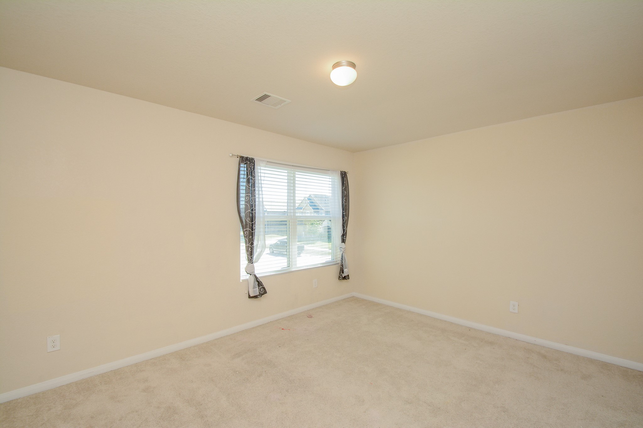 2214 Forest Court Rosenberg, TX 77471 - Photo 13 of 20 an empty room with large windows