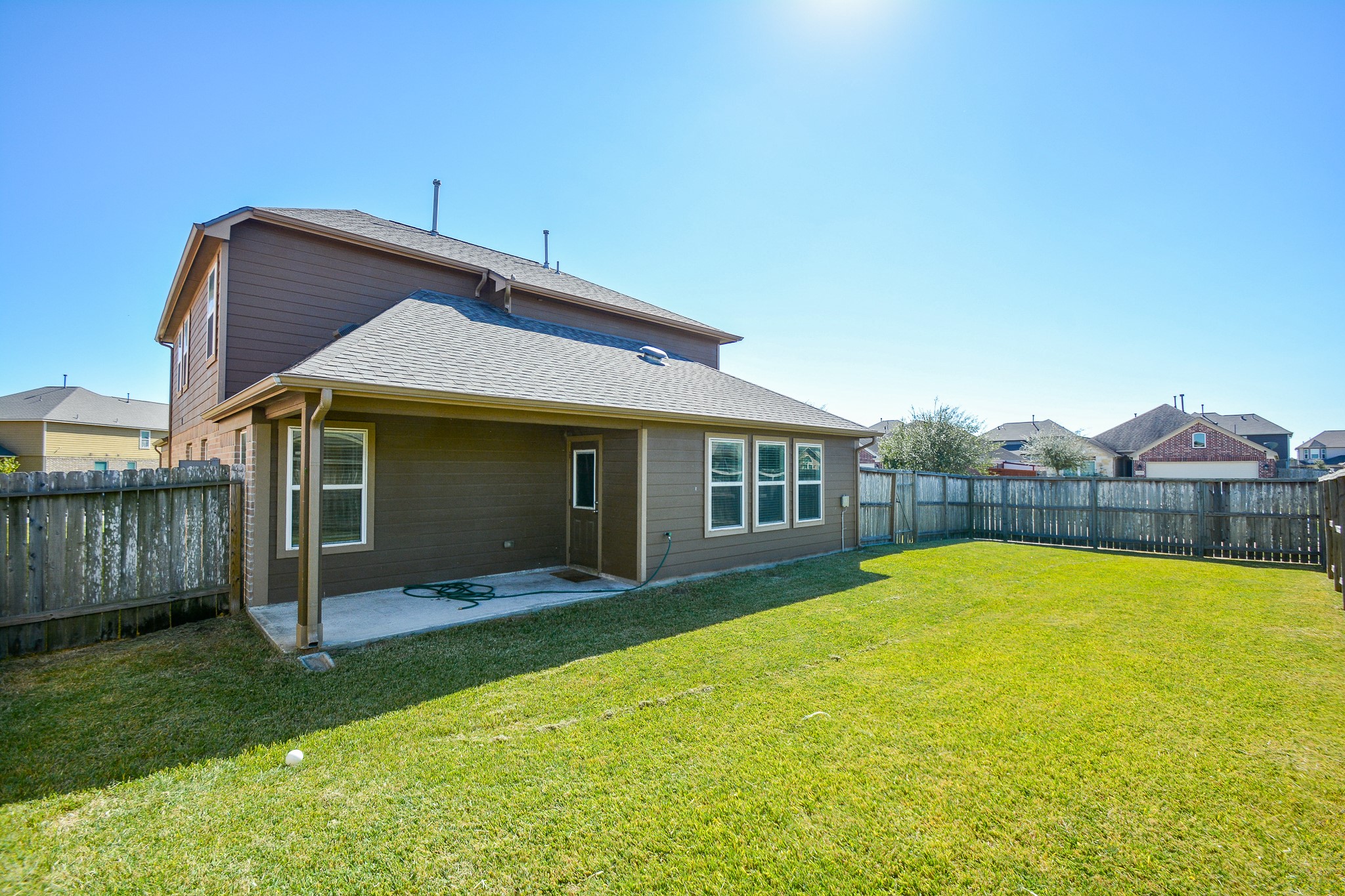 2214 Forest Court Rosenberg, TX 77471 - Photo 20 of 20 a view of a house with a swimming pool and a yard