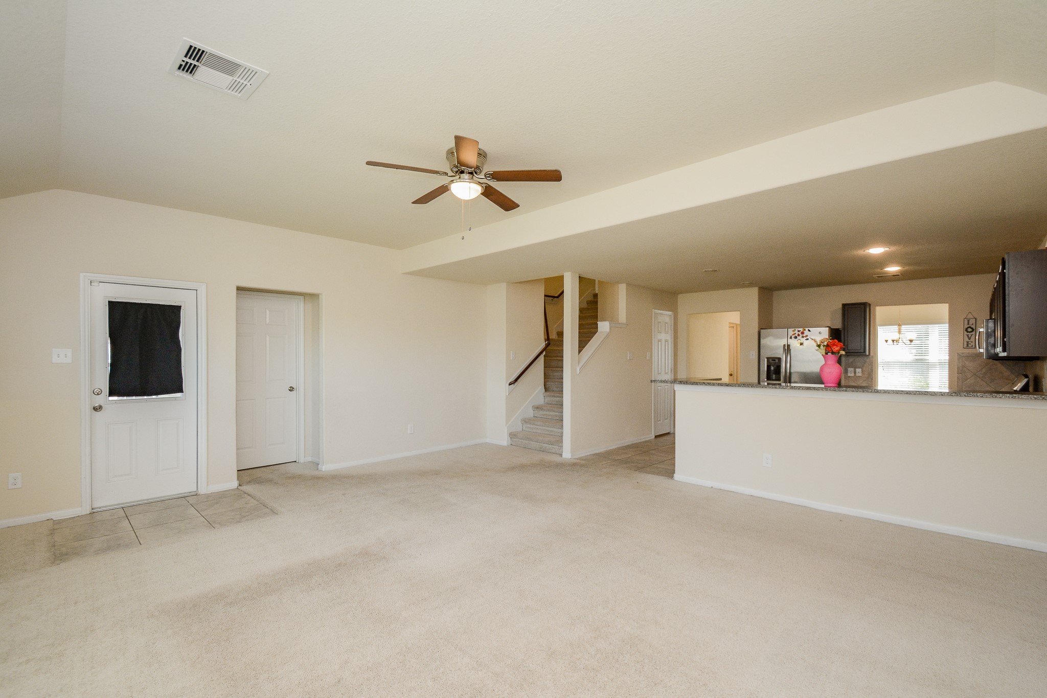 2214 Forest Court Rosenberg, TX 77471 - Photo 3 of 20 a view of empty room with wooden floor and ceiling fan