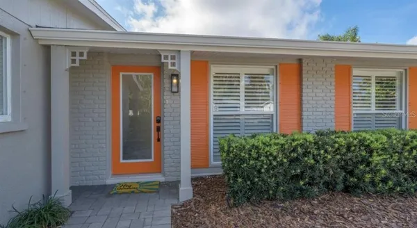 a view of a door in front of a house