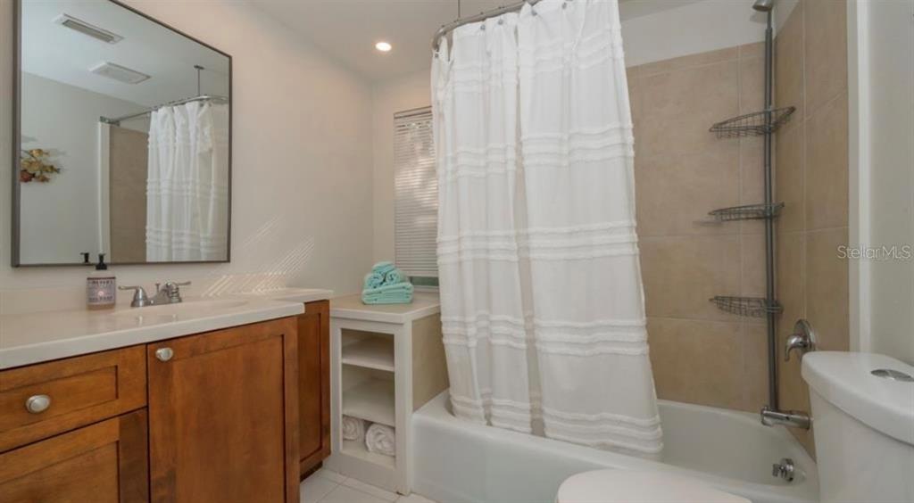 2904 Homasassa Road Sarasota, FL 34239 - Photo 23 of 37 a bathroom with a sink toilet and shower