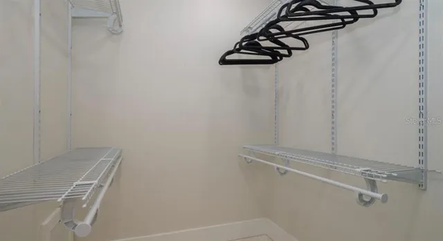 a view of a room with rack on the wall