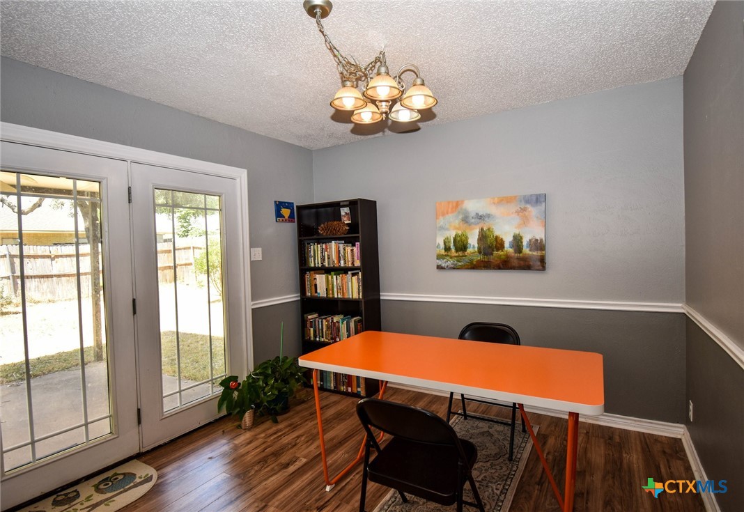 2202 Stagecoach Trail Temple, TX 76502 - Photo 4 of 27 a view of a room with furniture wooden floor and window