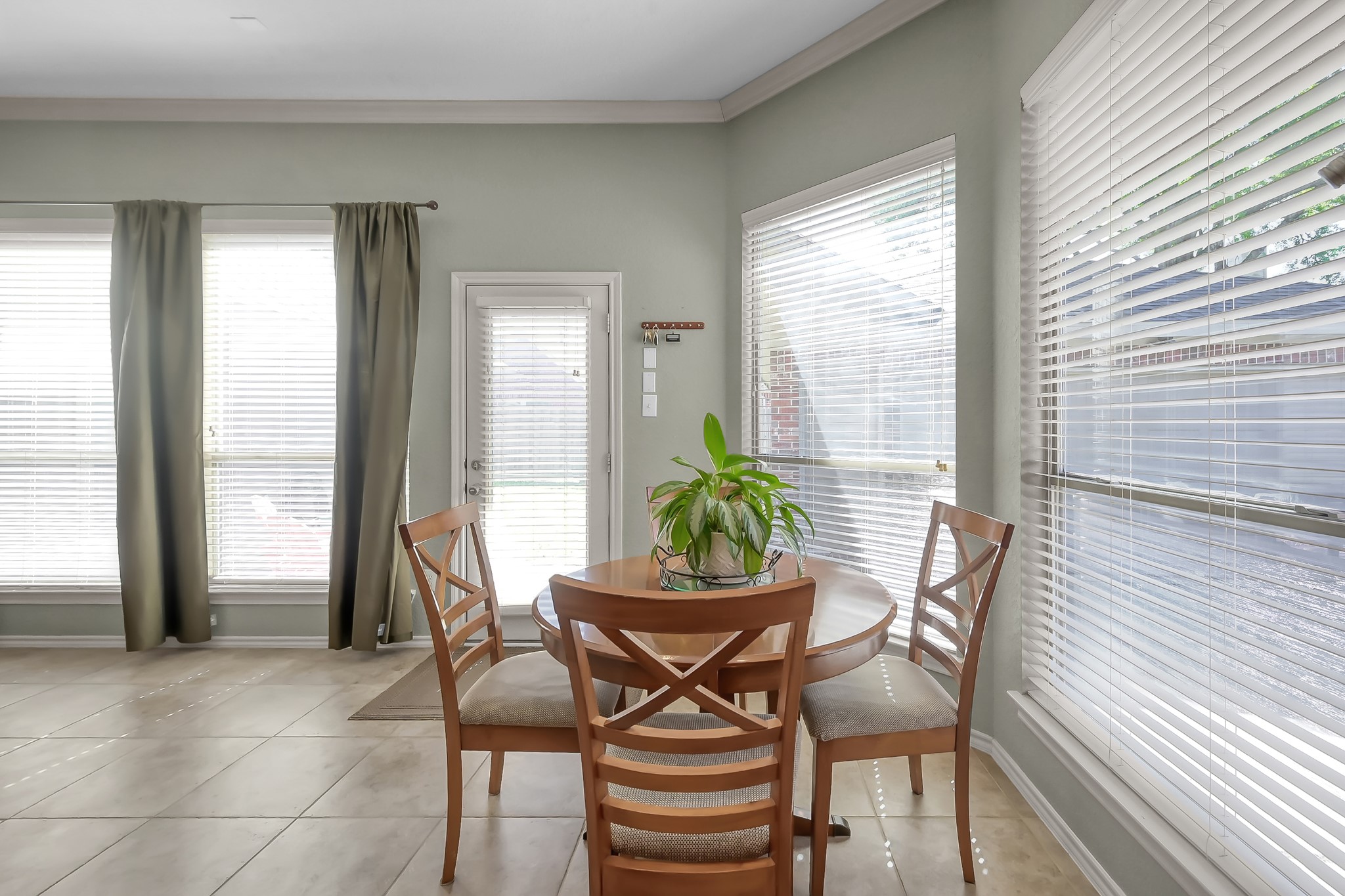 2318 Caroline Park Lane Spring, TX 77386 - Photo 20 of 38 a view of a dining room with furniture and window
