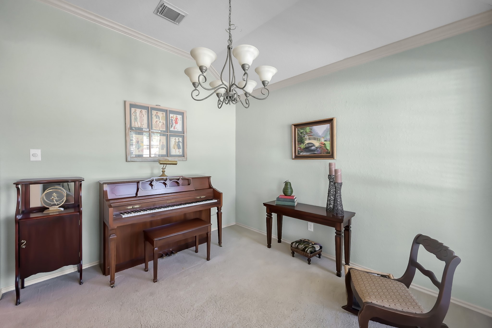 2318 Caroline Park Lane Spring, TX 77386 - Photo 7 of 38 a living room with furniture and a chandelier