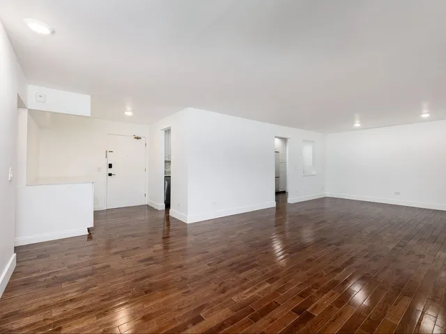a view of a big room with wooden floor