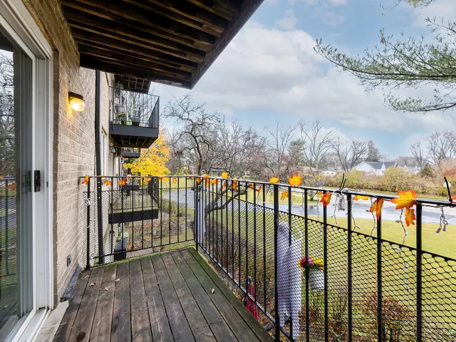 a kitchen with granite countertop a sink stove and cabinets