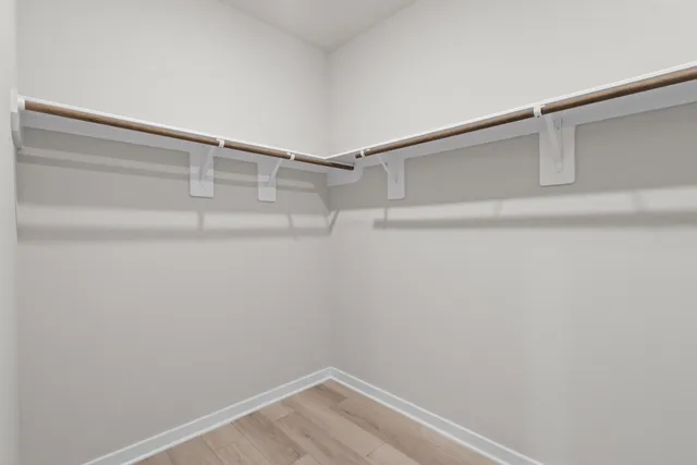 a view of an empty walk in closet