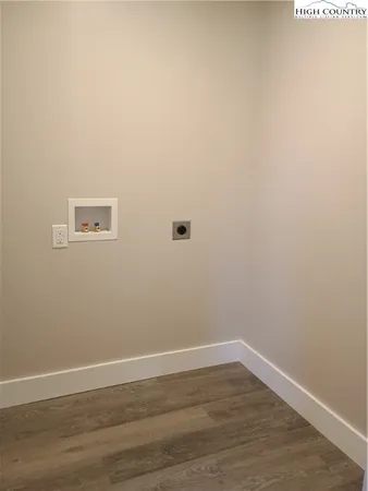 a view of a small space with wooden floor