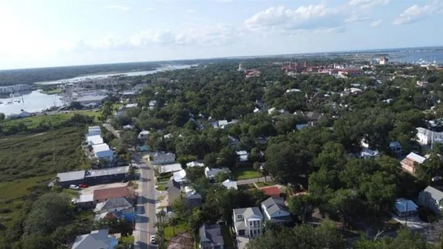 an aerial view of a city with lots of residential buildings