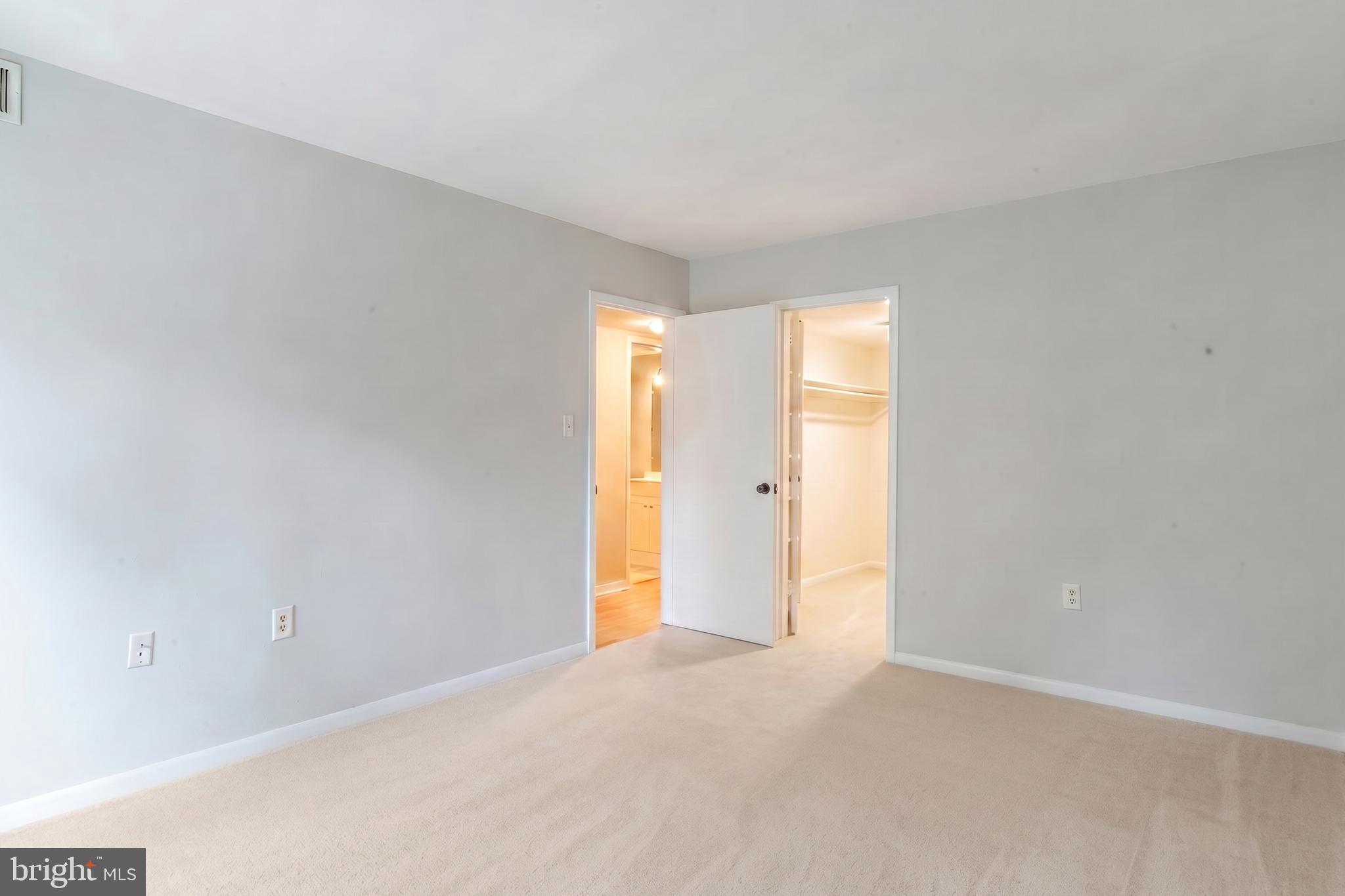 1422 Northgate Square, Unit 12B Reston, VA 20190 - Photo 14 of 36 Primary Bedroom