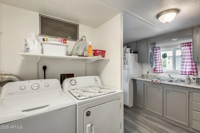 a utility room with dryer and washer